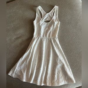 White racer back mini dress. Size Small. Boutique dress, nice material.